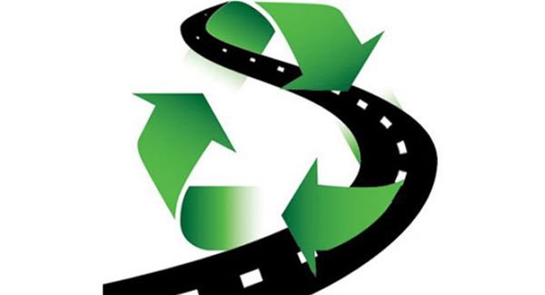 Icon of recycle symbol over road